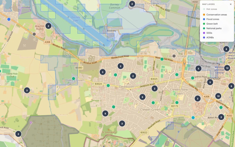 A SiteLens constraints map overlaying conservation areas, flood zones, green belt, national parks, SSSIs and AONBs across a region